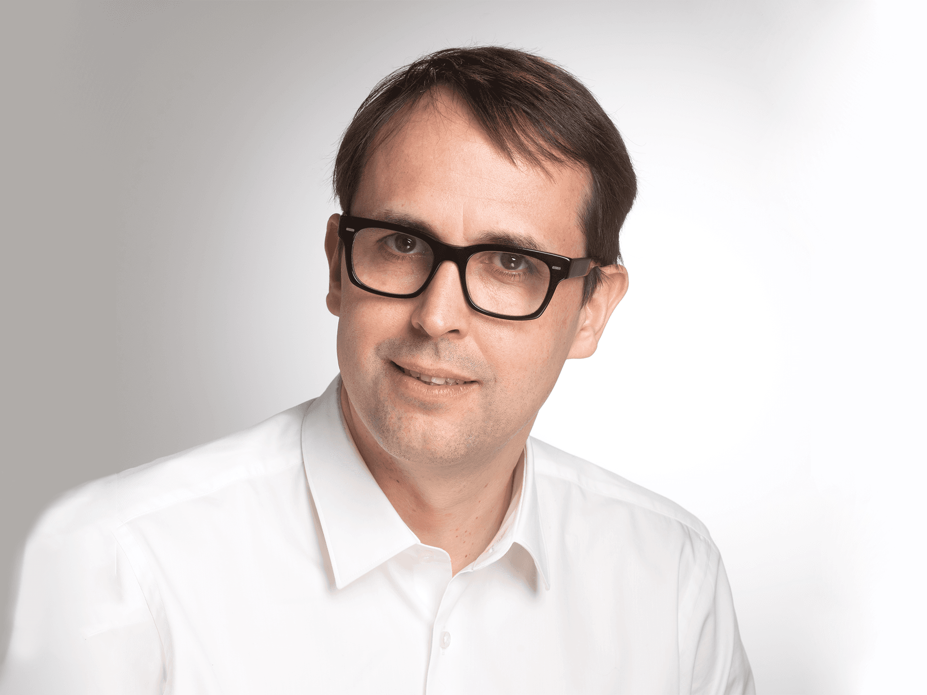 Headshot of David Wilson, Chief Technology Officer at Fire.